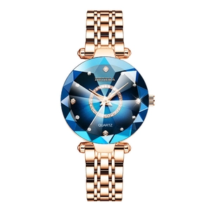 Elegant rose gold watch with blue gradient star dial and faceted crystal glass mirror