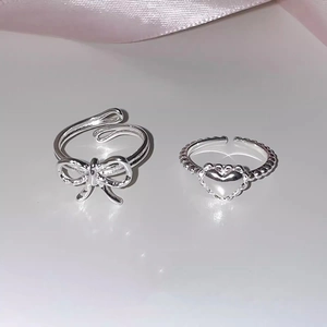 Minimalist S925 sterling silver open rings with elegant bow and heart shaped designs