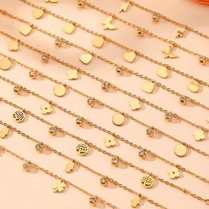 Golden titanium steel necklace with heart, butterfly and clover charms with rhinestones