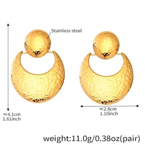 Detail showing gold hammered finish moon earrings with measurements and weight specifications