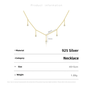 Detail showing gold plated S925 silver long chain necklace with clear white stones