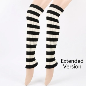Detail view of extra long black and white striped knitted leg warmers for JK style