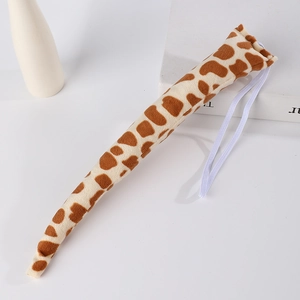 Detail of plush giraffe print animal tail with elastic strap for costume accessories