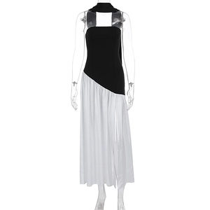 Detail of a color-block sexy banquet dress with bodycon fit and asymmetric hemline