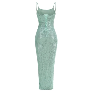 Detail of mint green sequin dress featuring an open back with lace-up drawstring design