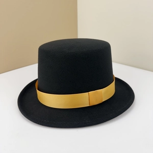 Classic black wool felt top hat with elegant gold ribbed band for formal events