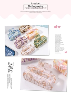 Detail shot of marble pattern square claw clips in various candy colors and textures