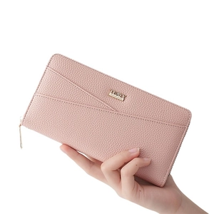 Pink long zipper wallet for women in litchi grain leather with metal nameplate detail