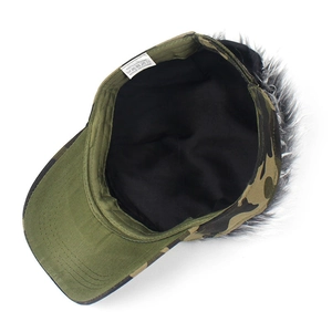 Detail view of cotton camo military cap with grey faux fur lining and fabric label