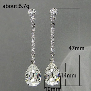 Elegant pear-shaped drop earrings with shiny AAA cubic zirconia stones, length 47mm