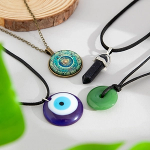 Retro ethnic style 4-piece necklace set with glass charms and bohemian geometric pendants