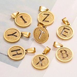Polished 18K gold plated stainless steel round alphabet pendants with glitter sand texture