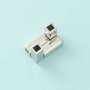 Macro shot of silver stainless steel hollow rectangular jewelry connector component