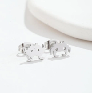 Minimalist silver stainless steel stud earrings with pixel art alien space invader design