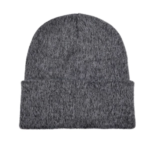 Close-up of marled grey knitted beanie showing thick textured fabric and cuffed edge