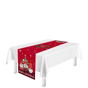 Christmas Gnome table runner with red Merry Christmas print and festive tree patterns