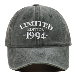 Close-up of high-density white embroidery LIMITED EDITION 1994 on washed cotton baseball cap