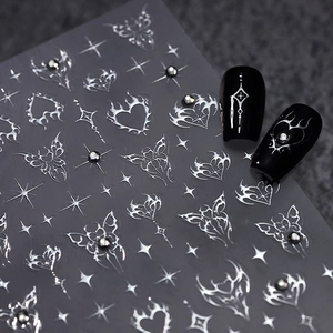 Y2K style silver 3D embossed butterfly heart nail stickers with metallic star accents