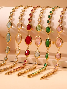 Detailed macro shot of oval-cut colorful zircon bracelets with 18k gold plated finish