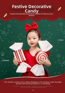 Detail of red and white striped Christmas candy ornament held by a young child