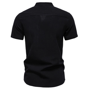 Back view detail of black cotton linen short sleeve shirt showing fabric texture