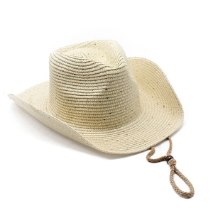 Detail of beige straw cowboy hat weave texture with adjustable chin strap and wind cord