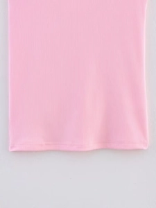 Detailed close-up of pink ribbed knit fabric and flat overlock stitching on the hemline