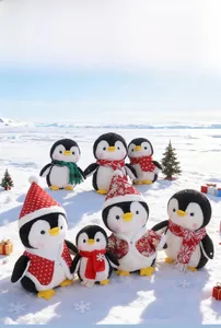 Detailed collection of plush Christmas penguins with festive scarves and hats on snow