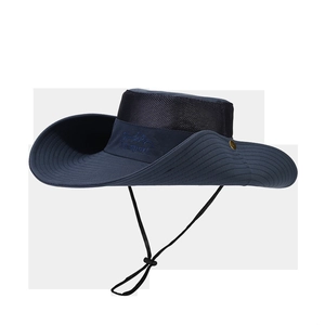 Detailed view of breathable mesh top and adjustable chin strap on navy sun hat