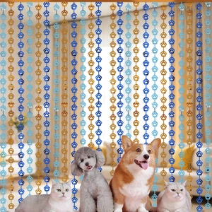 Blue and gold paw print fringe curtain decoration backdrop for pet themed parties