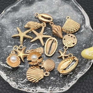 Golden ocean charms collection with sea shell, starfish and pearls for DIY jewelry making