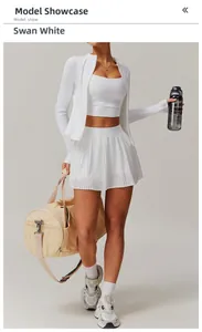 Swan White yoga set featuring zip jacket, sports bra and pleated tennis skirt set