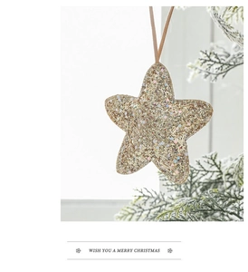 Sparkly gold star Christmas ornament with sequins and glitter for festive tree decoration