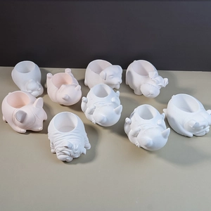 Minimalist animal shaped succulent pots in dog and polar bear designs for home decor