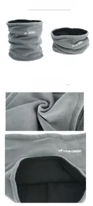 Close-up of gray polar fleece neck warmer showing soft texture and foldable design