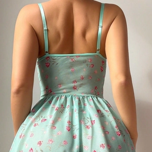Mint green floral print slip dress with thin straps and open back for summer fashion