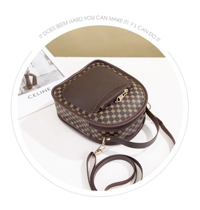 Classic vintage brown printed backpack with golden geometric patterns and adjustable straps