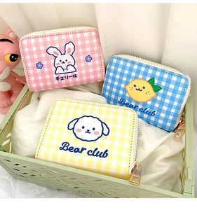 Detailed shot of cute checkered mini card holders in pink blue and yellow plaid designs