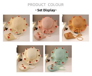 Detail view of girls' cherry straw hat and matching bag sets in five assorted colors