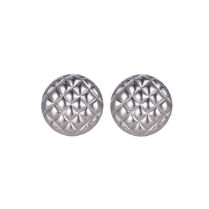Close-up of silver stainless steel round stud earrings featuring a quilted lattice pattern