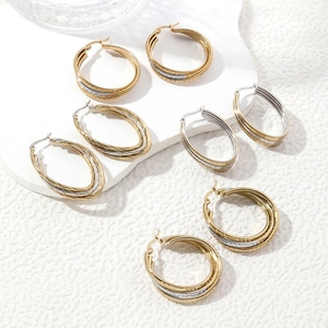 Minimalist multi-layer gold and silver stainless steel hoop earrings in various sizes