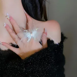 Elegant gold feather butterfly open ring with sparkling stones for women's fashion