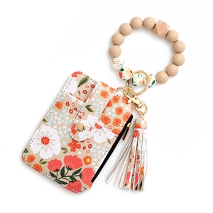 Floral silicone bead keychain wallet set with wristlet strap and tassel detail