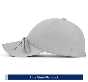Side view of lightweight light gray sun hat featuring a decorative bow on the brim