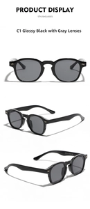 Detail view of retro black sunglasses with gold arrow hinges and gray lenses
