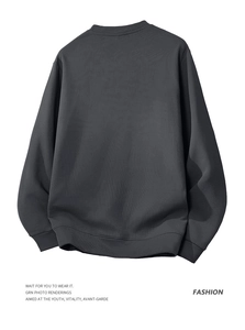 Back view of dark grey crewneck sweatshirt featuring ribbed cuffs and hem detail