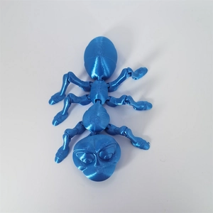 Detail of blue 3D printed ant toy with movable joint structure and layered texture