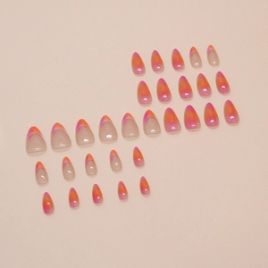 Almond-shaped orange and pink sunset gradient press-on nails with French tip details