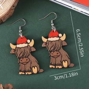 Christmas Highland Cow wooden earrings with red Santa hats and dimensional markings