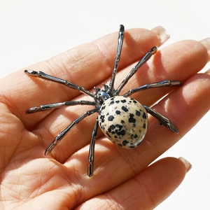 Natural dalmatian jasper stone spider ornament with polished dark metal legs